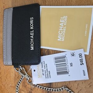 Michael Kors credit card ID wallet with chain.